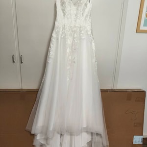 Sarah added a photo of their purchase