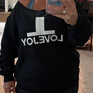 Lisa added a photo of their purchase