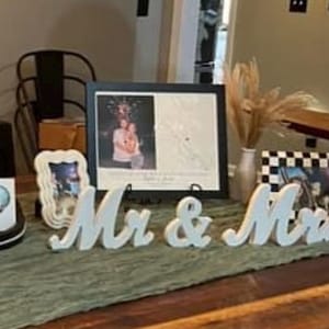 Laura added a photo of their purchase