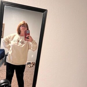 Kelly added a photo of their purchase