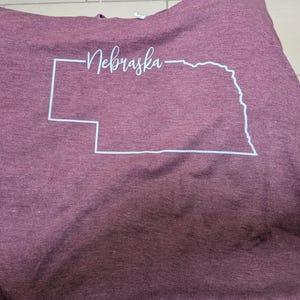 Sarah added a photo of their purchase
