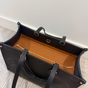 Gloria added a photo of their purchase