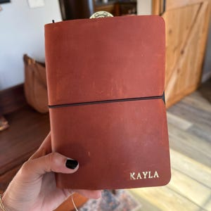 Kayla added a photo of their purchase