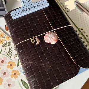 Diana added a photo of their purchase