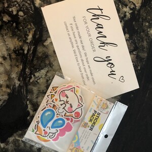 Angela added a photo of their purchase