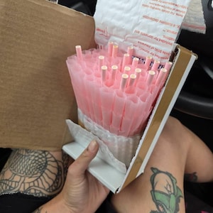 Caitlin added a photo of their purchase