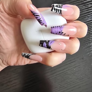 Jasmin added a photo of their purchase