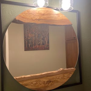 Sheryl added a photo of their purchase