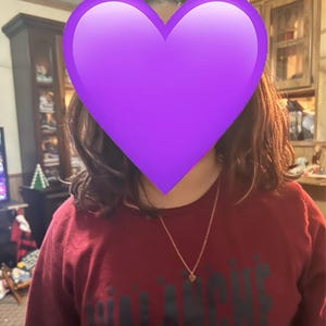 Caitlin added a photo of their purchase