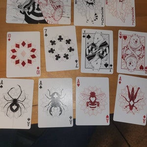 WILD REIGN Playing Cards: Evergreen and Crimson Decks