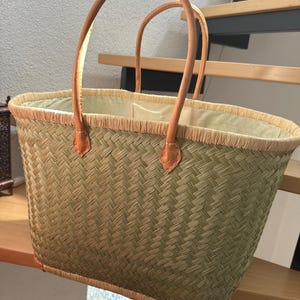 Sandra added a photo of their purchase