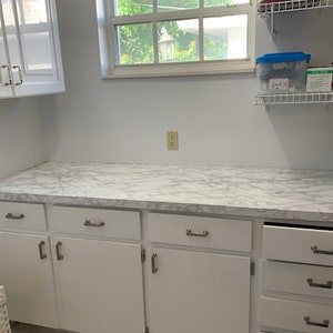 Susan added a photo of their purchase