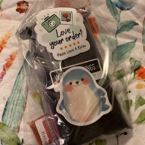 Shela added a photo of their purchase