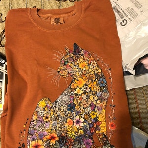 Sharon added a photo of their purchase