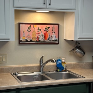 Gwen added a photo of their purchase