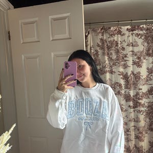 Katie added a photo of their purchase