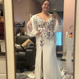 Cristina added a photo of their purchase