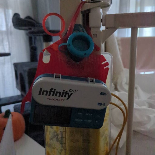 Tubie Hang™ Orange G-tube Feeding Pump Hanger for Infinity 