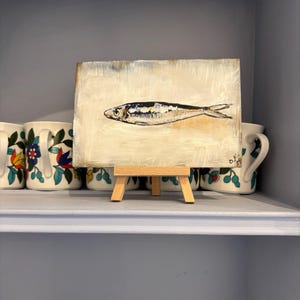 Gill added a photo of their purchase