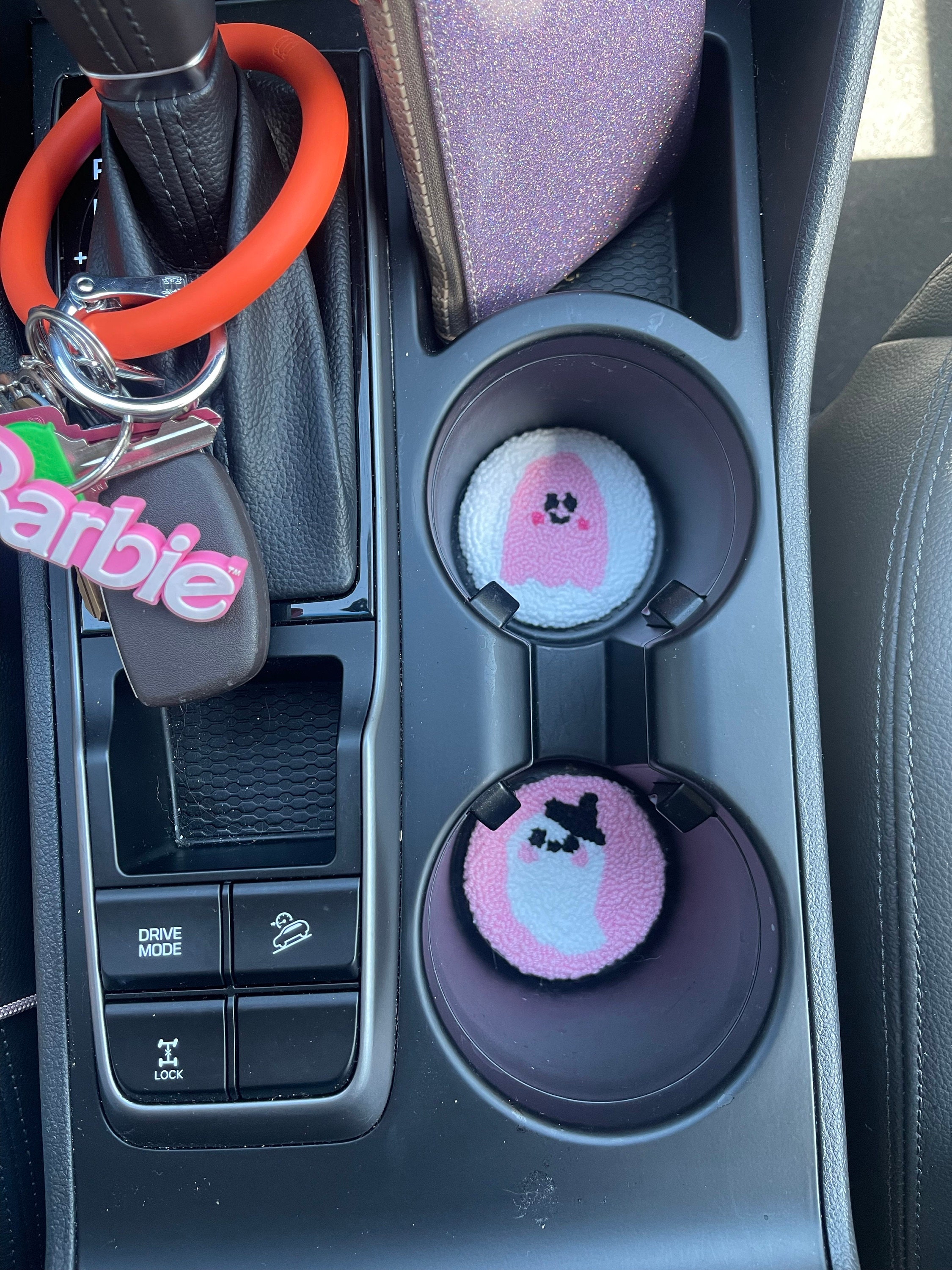 Super cute! Fits in my car’s cup holders perfectly, and I almost don’t want t...