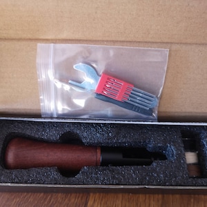 Marie-Paule added a photo of their purchase