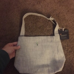 Sarah added a photo of their purchase