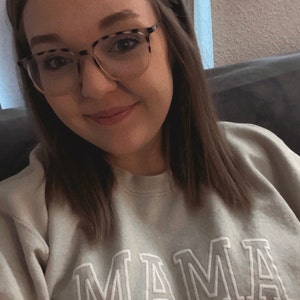 Kayla added a photo of their purchase