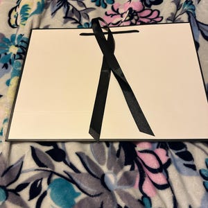 Beverly added a photo of their purchase