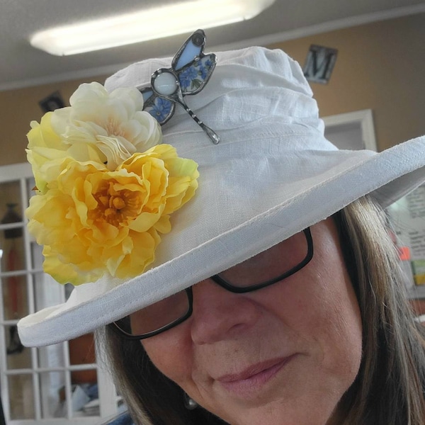 Soft Ruched Cloche Style Winter Hat Adorned With Textured Flower Trim
