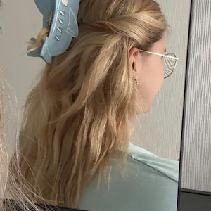 Nina added a photo of their purchase