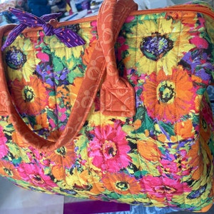 Pam added a photo of their purchase