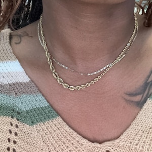 Aisha added a photo of their purchase