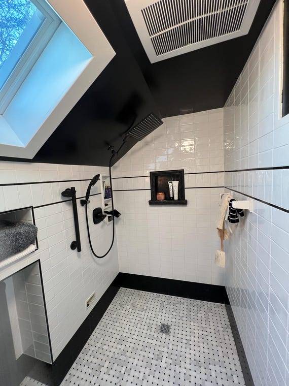 Tracy H.'s after project images usingNero Marquina  Hand Made Shower Niche - Small