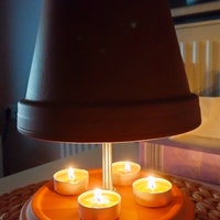 Produktbild von XXL Kugel-Teelichtofen Aus Basalt (ø26cm) - Doppelwandige Übergangsheizung