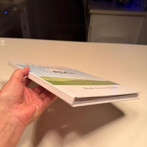 Sharon added a photo of their purchase