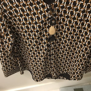 Sharon added a photo of their purchase
