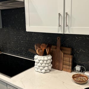 Kelly added a photo of their purchase