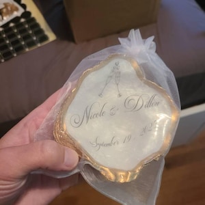 Nicole added a photo of their purchase
