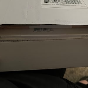 Gina added a photo of their purchase
