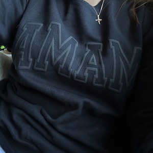 Alexandra added a photo of their purchase
