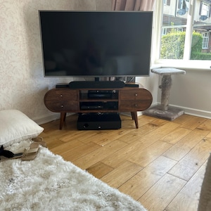 Nicola added a photo of their purchase