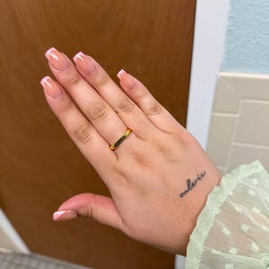 Kayla added a photo of their purchase