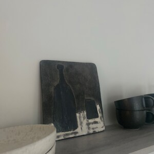 Sina added a photo of their purchase