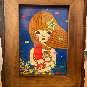 Natalie added a photo of their purchase