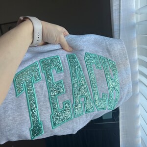 Kayleigh added a photo of their purchase