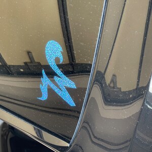 Sharon added a photo of their purchase