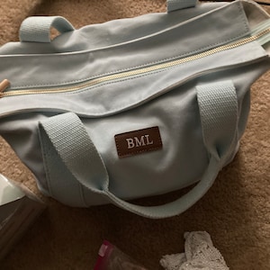 Sarah added a photo of their purchase