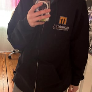 Zoe added a photo of their purchase