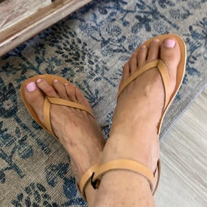 Gina added a photo of their purchase