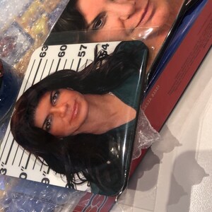 Cristina added a photo of their purchase